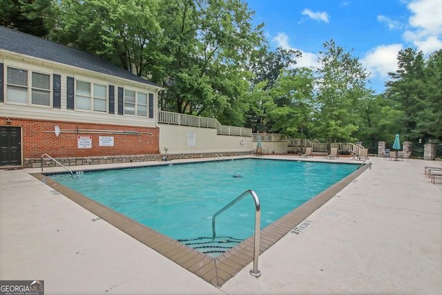 view of pool with a patio