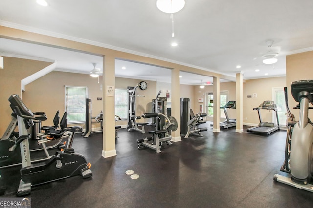 exercise room with ceiling fan and ornamental molding