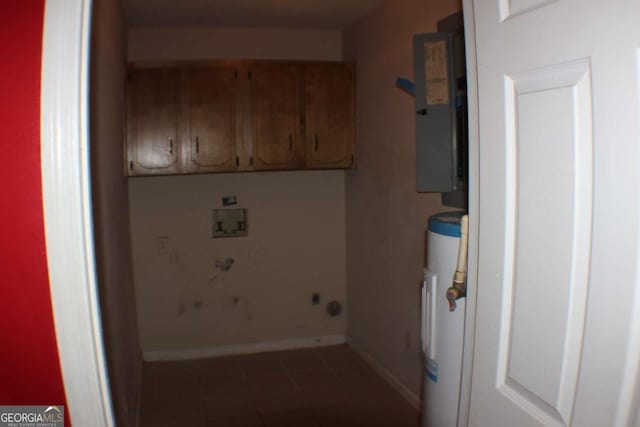 laundry area with cabinets, hookup for a washing machine, electric panel, and water heater