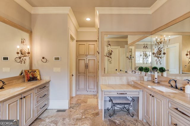 bathroom with vanity, crown molding, and an inviting chandelier