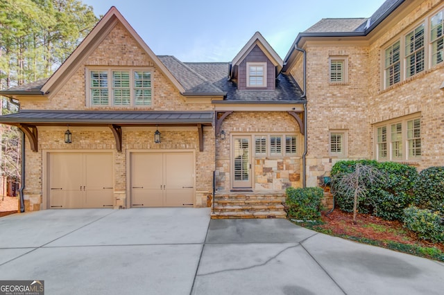 view of front of home with a garage