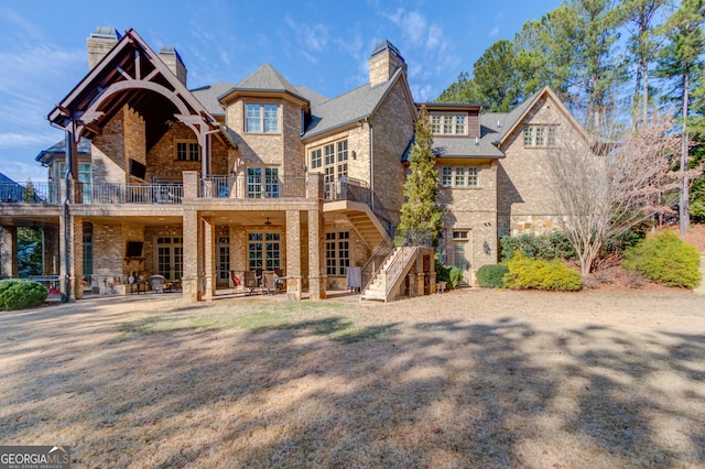 view of front of house with a balcony