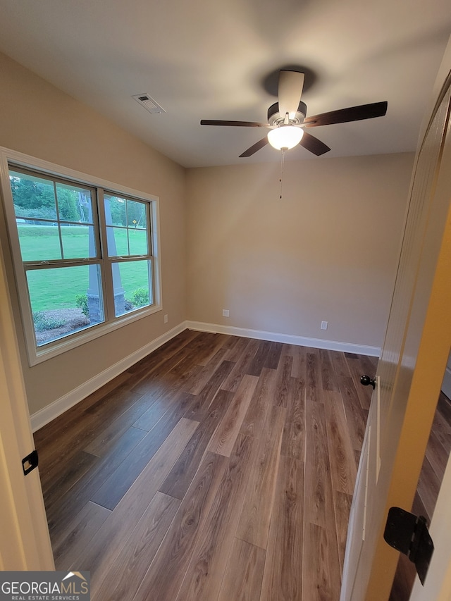 15 Dixon Rd, Newnan, GA 30263 - unfurnished room with a ceiling fan, baseboards, visible vents, and wood finished floors