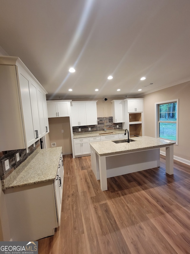 15 Dixon Rd, Newnan, GA 30263 - kitchen featuring a sink, backsplash, recessed lighting, and an island with sink