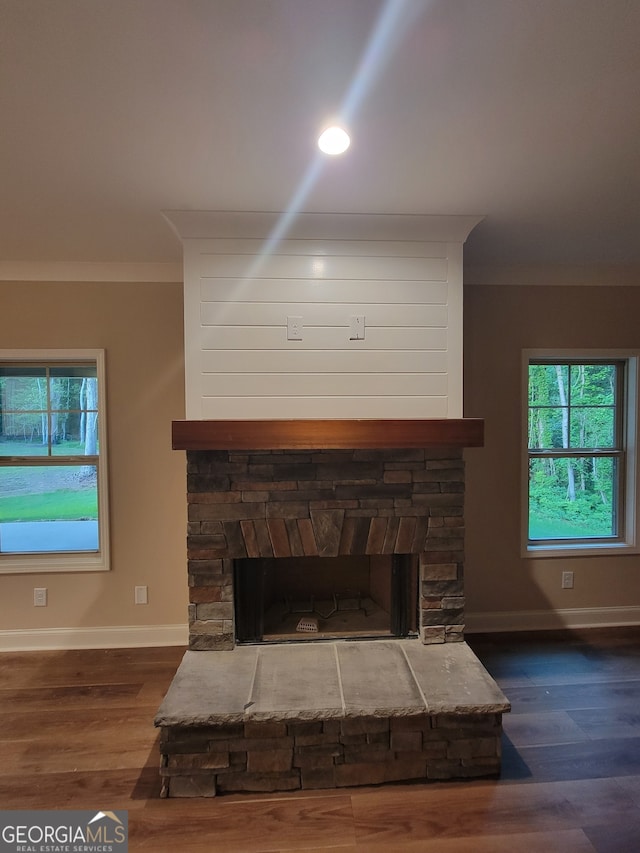 15 Dixon Rd, Newnan, GA 30263 - interior details featuring baseboards, wood finished floors, and a fireplace