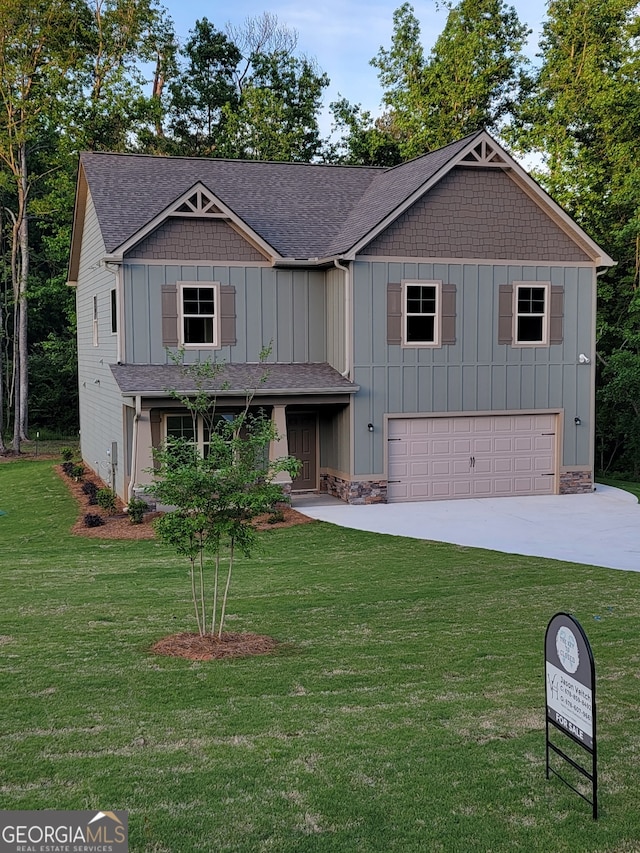 15 Dixon Rd, Newnan, GA 30263 - craftsman house featuring a front lawn, roof with shingles, board and batten siding, concrete driveway, and an attached garage