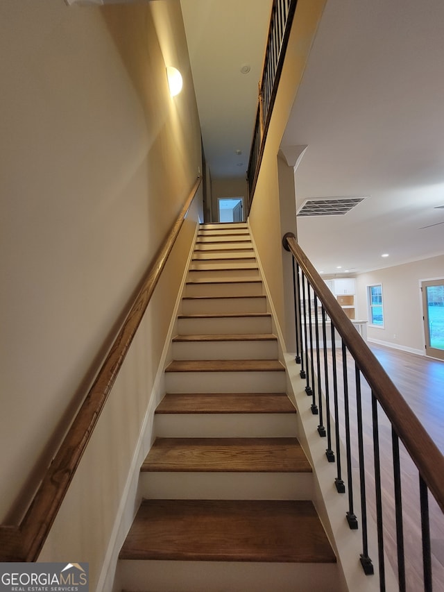 15 Dixon Rd, Newnan, GA 30263 - staircase with visible vents, recessed lighting, and wood finished floors
