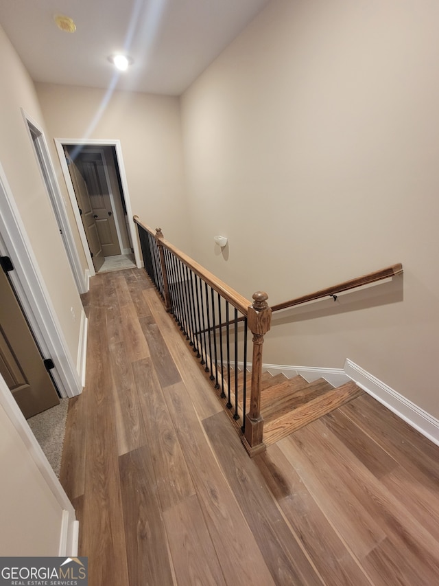 15 Dixon Rd, Newnan, GA 30263 - stairway featuring baseboards and wood finished floors