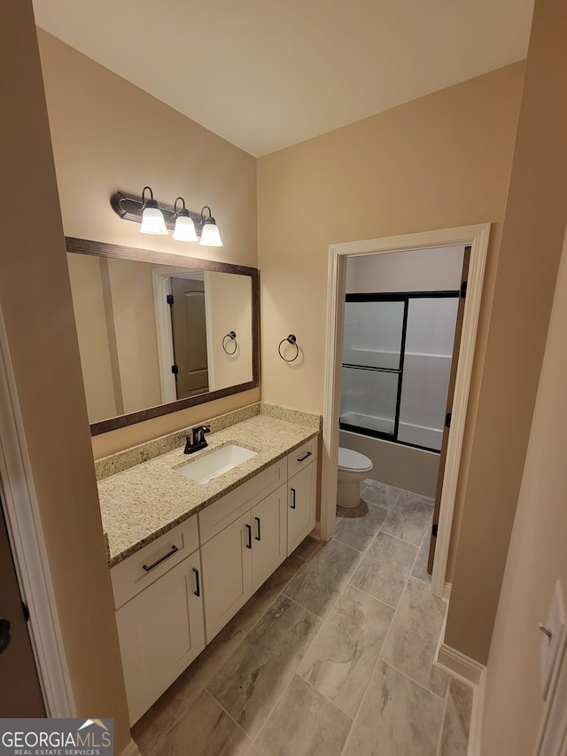 15 Dixon Rd, Newnan, GA 30263 - bathroom with toilet, marble finish floor, bath / shower combo with glass door, and vanity