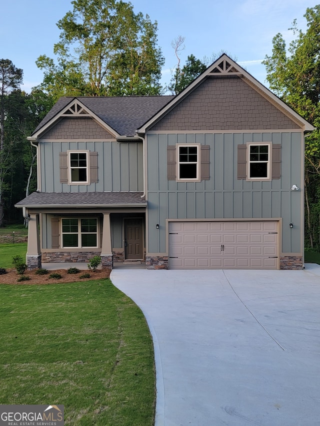 15 Dixon Rd, Newnan, GA 30263 - craftsman inspired home featuring an attached garage, stone siding, board and batten siding, a front yard, and concrete driveway