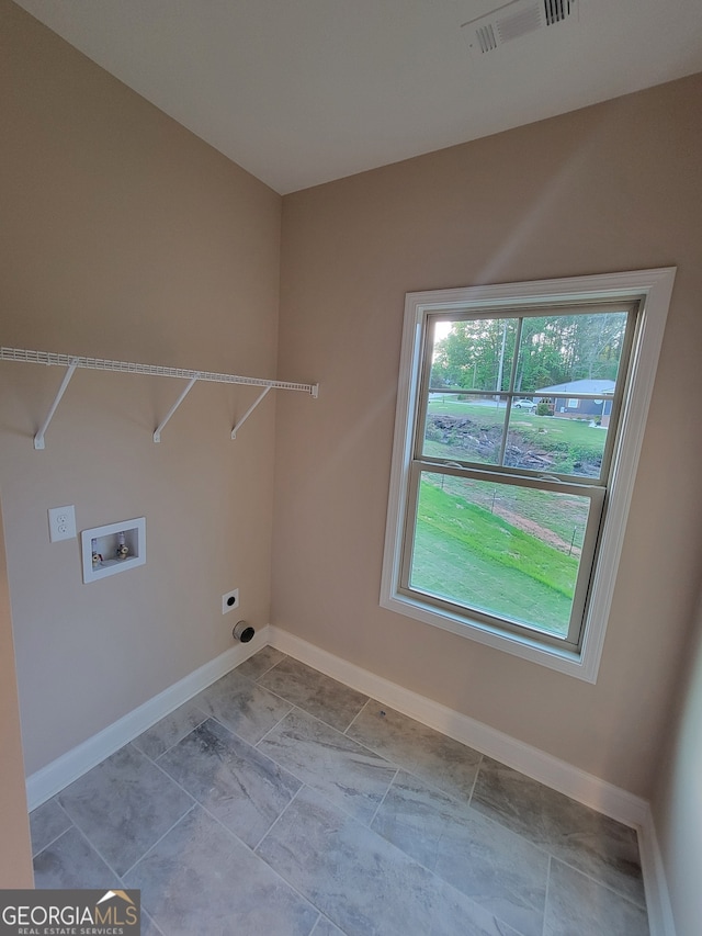 15 Dixon Rd, Newnan, GA 30263 - laundry room with visible vents, laundry area, baseboards, electric dryer hookup, and washer hookup