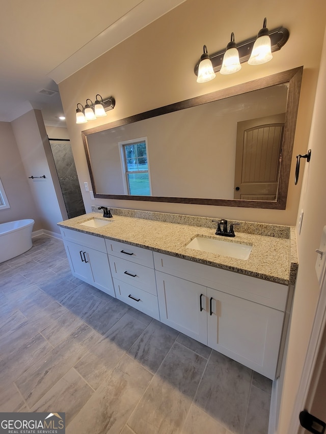 15 Dixon Rd, Newnan, GA 30263 - full bath featuring double vanity, a sink, and a freestanding bath