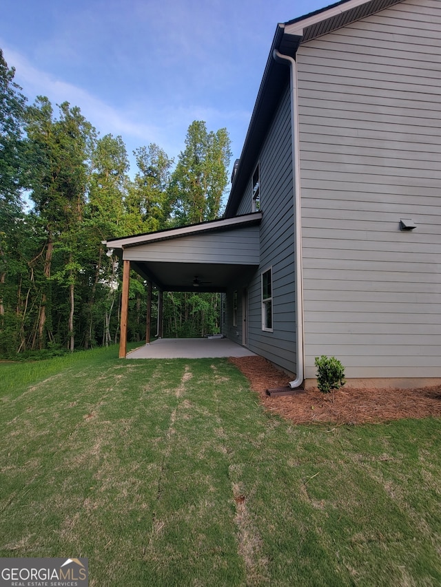 15 Dixon Rd, Newnan, GA 30263 - view of property exterior with a patio area and a yard