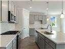 kitchen featuring pendant lighting and sink