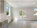 unfurnished living room with a wealth of natural light