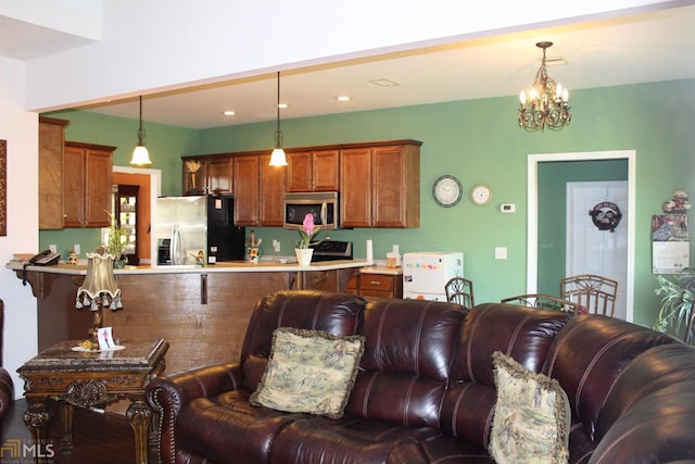 living room with an inviting chandelier