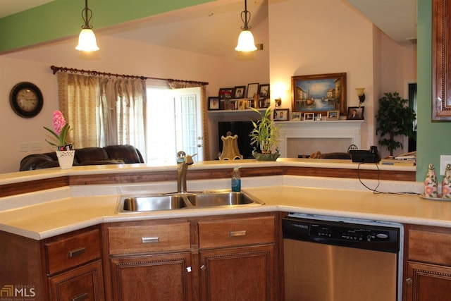 kitchen with pendant lighting, sink, and stainless steel dishwasher