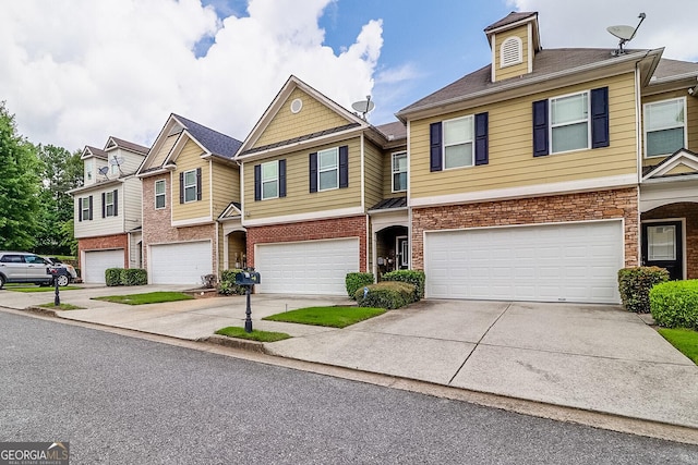 multi unit property featuring a garage