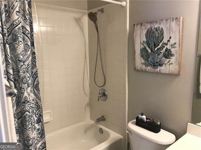 full bathroom featuring vanity, toilet, and shower / tub combo with curtain