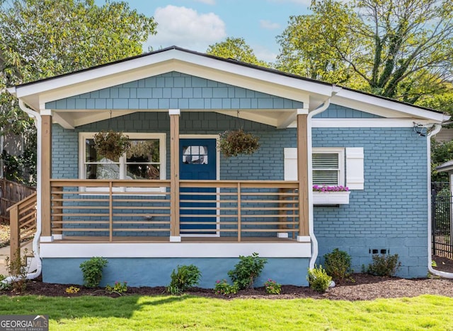 view of front of home featuring covered porch