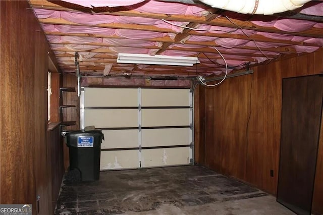 garage with wood walls