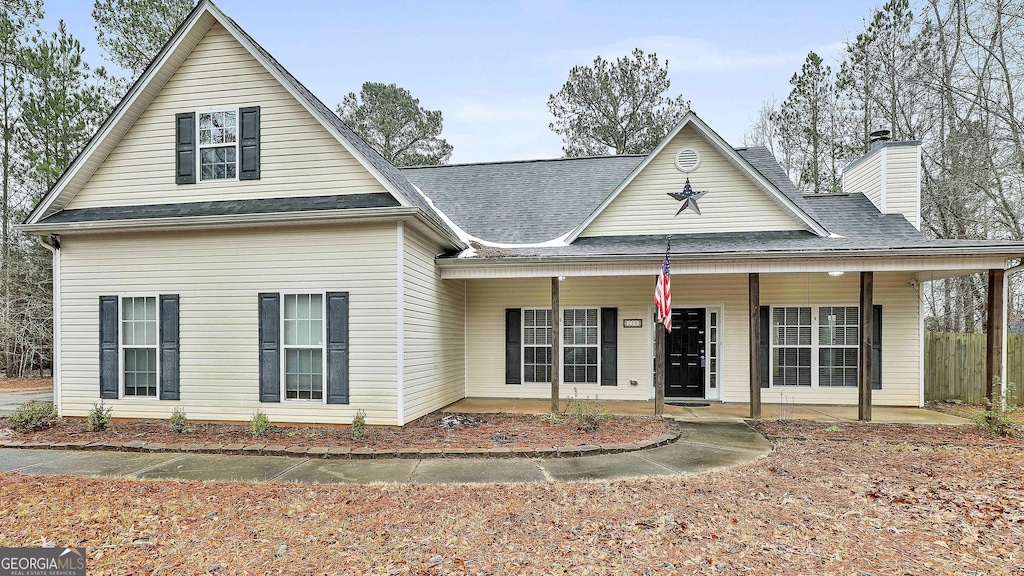 view of front of property featuring covered porch