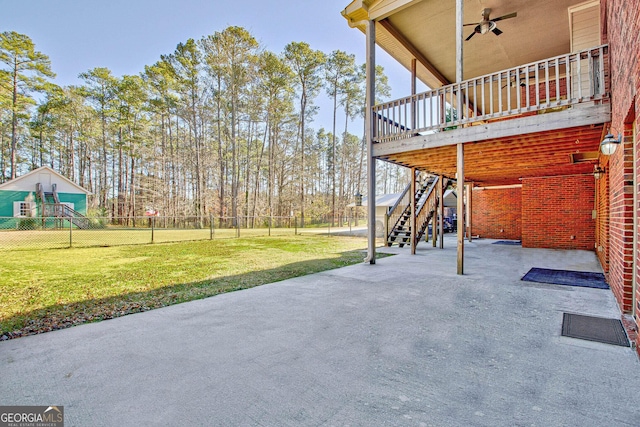 view of patio / terrace featuring a wooden deck and ceiling fan