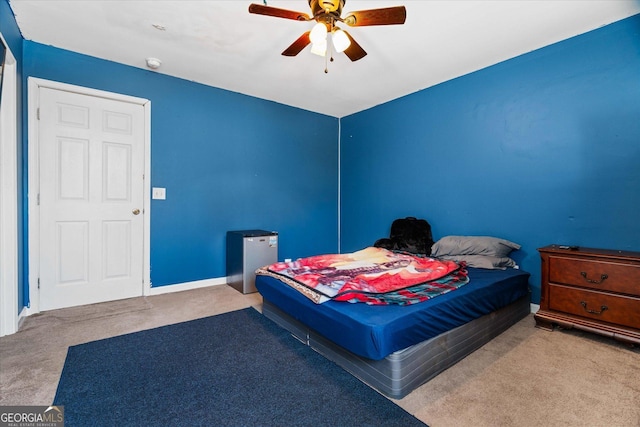 carpeted bedroom featuring ceiling fan