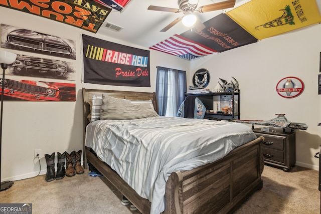 bedroom with ceiling fan and carpet floors