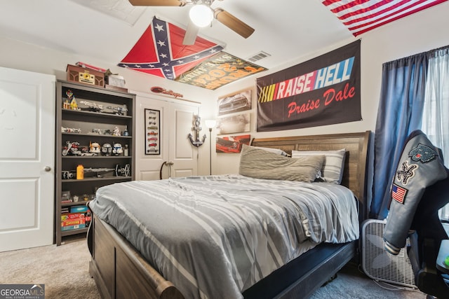 carpeted bedroom with ceiling fan