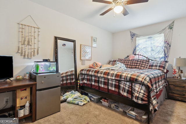 bedroom with ceiling fan and carpet