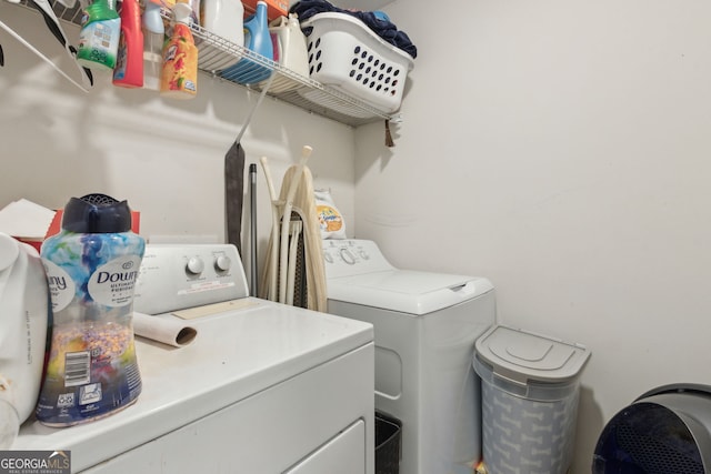 laundry area featuring washing machine and dryer