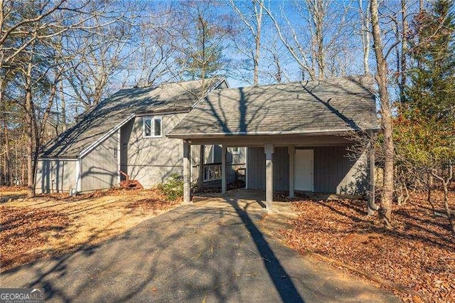 view of front of home with a carport