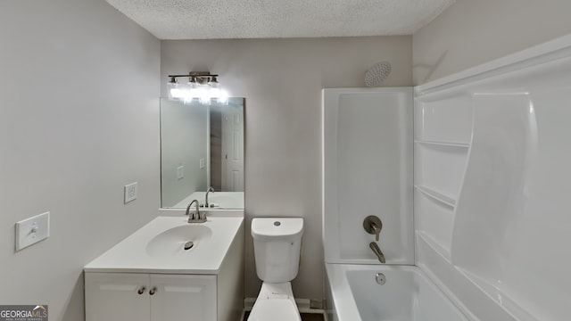 full bathroom with shower / tub combination, vanity, a textured ceiling, and toilet