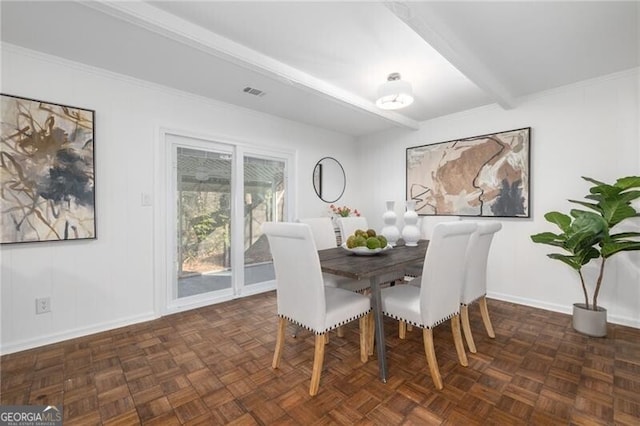 dining area with beamed ceiling, dark parquet floors, and crown molding