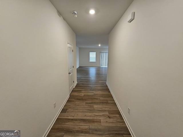 hall featuring dark wood-type flooring