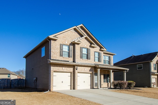 view of front of property with a garage