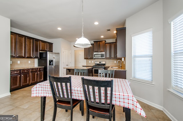 dining area with recessed lighting, visible vents, baseboards, and light tile patterned flooring