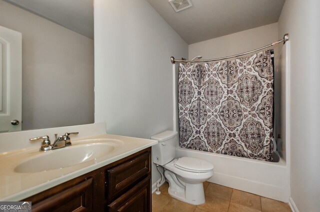 full bathroom featuring visible vents, toilet, tile patterned floors, shower / bathtub combination with curtain, and vanity