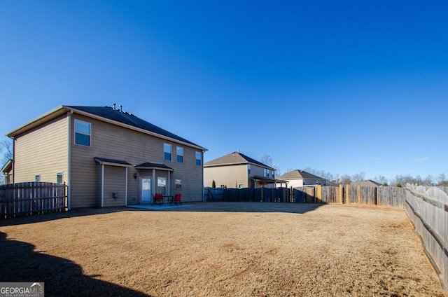 back of house featuring a patio