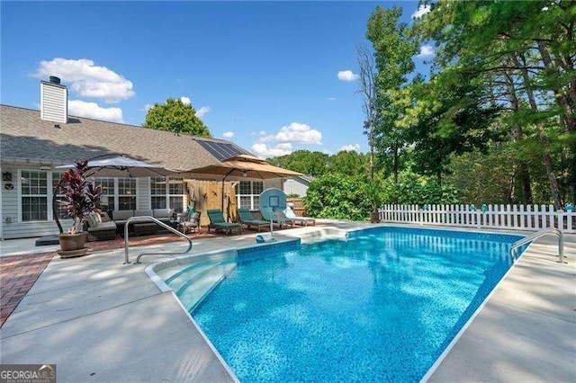 view of pool with a patio