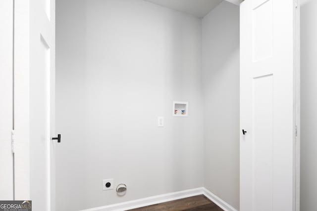 washroom with washer hookup, dark hardwood / wood-style floors, and electric dryer hookup