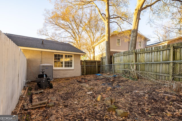 view of yard featuring central AC