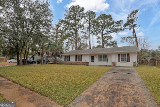 ranch-style house with a front yard