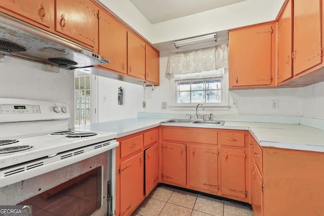 kitchen featuring sink, light tile patterned floors, and white electric stove