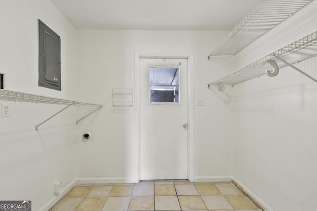 washroom featuring electric panel and electric dryer hookup