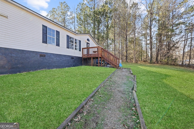 view of yard featuring a deck