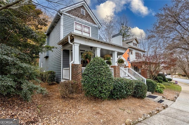 view of home's exterior featuring covered porch