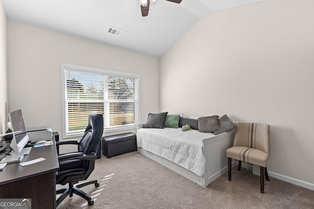 carpeted bedroom featuring vaulted ceiling and ceiling fan