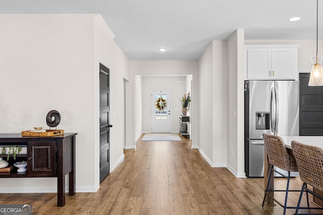 interior space with light hardwood / wood-style floors